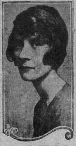 Peg Entwistle, with dark blonde hair closely framed around her head in a bob, looks at the camera from the side. She looks sullen.